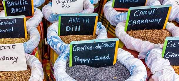 Various bags of grain marked with names