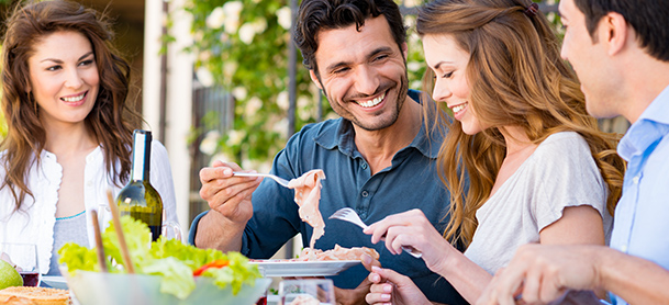 Couples enjoying a meal together