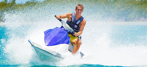 Man racing on jet ski